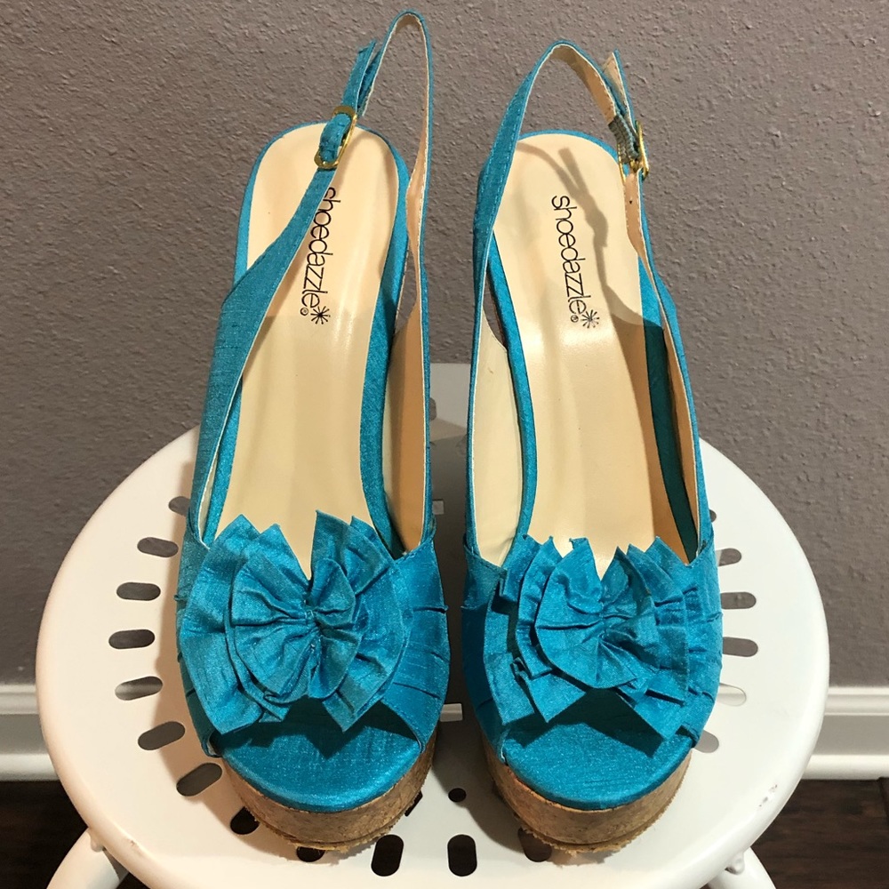 Teal sling back platforms